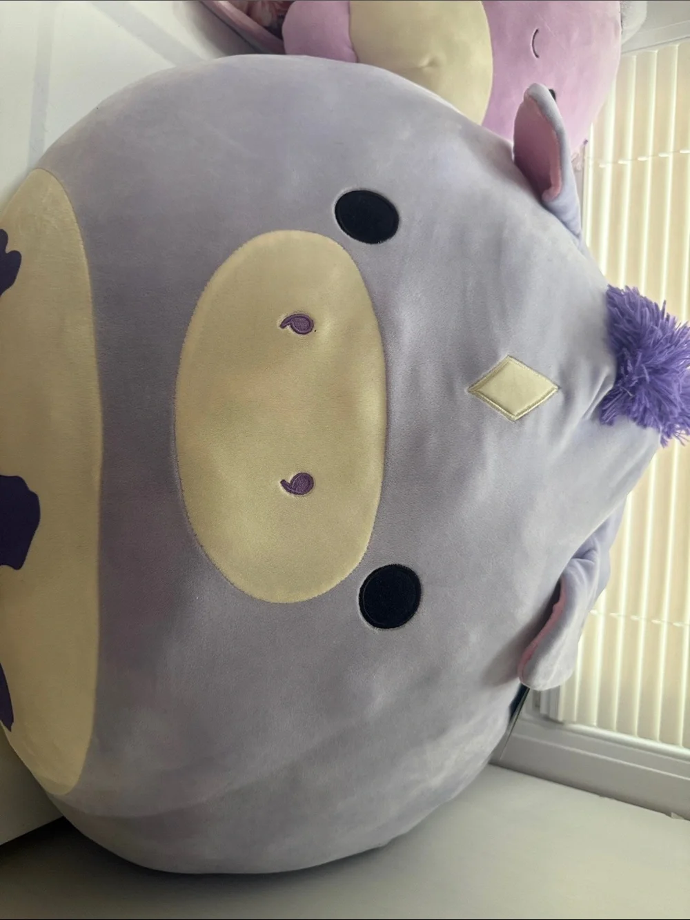 Squishmallows Lavender Unicorn Plush with Cream Accents